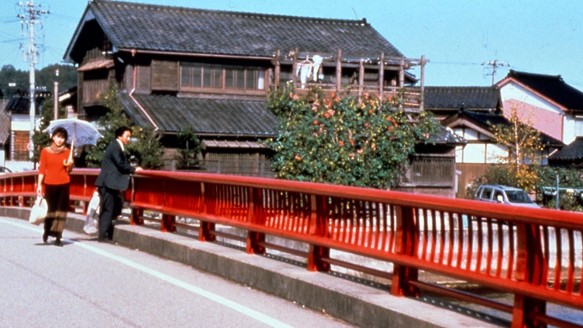 Foto do filme Água Quente Sob uma Ponte Vermelha